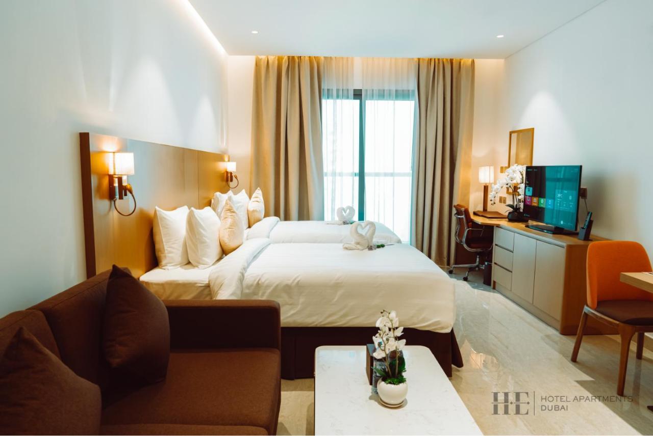 He Hotel Apartments Dubai Room photo Deluxe Room